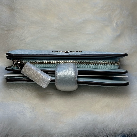 Kate Spade wallet- spade flower pvc color blue glow with gold accents. - Picture 3 of 8